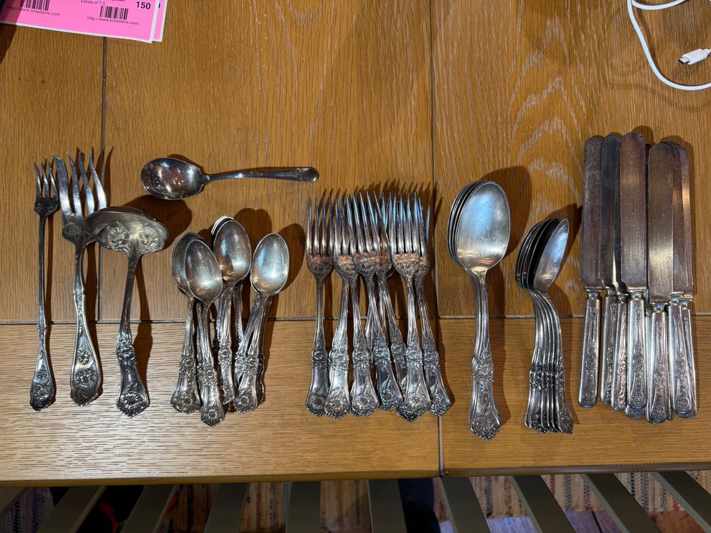 Mixed silver-plate serving pieces 