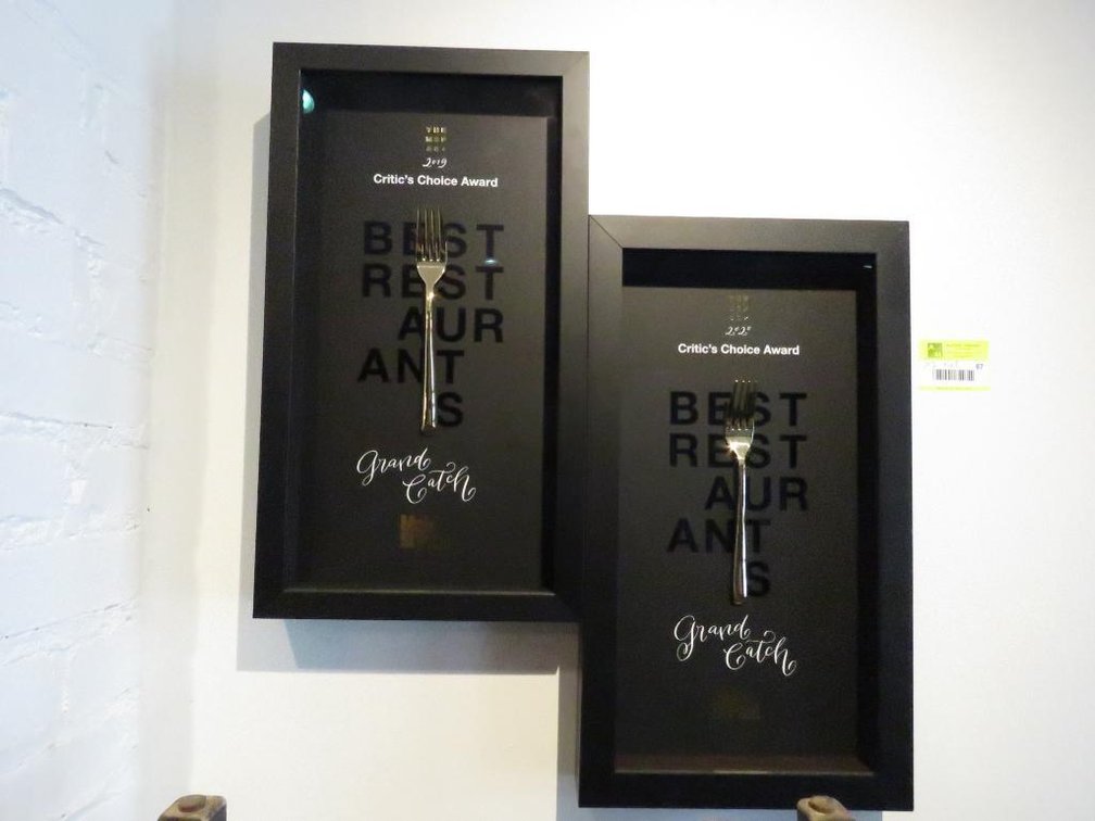 2 Assorted Framed Critics Choice Awards, 11"x19.75"