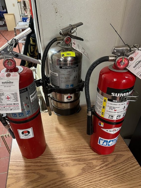 1 wet chemical and 2 dry chemical fire extinguishers