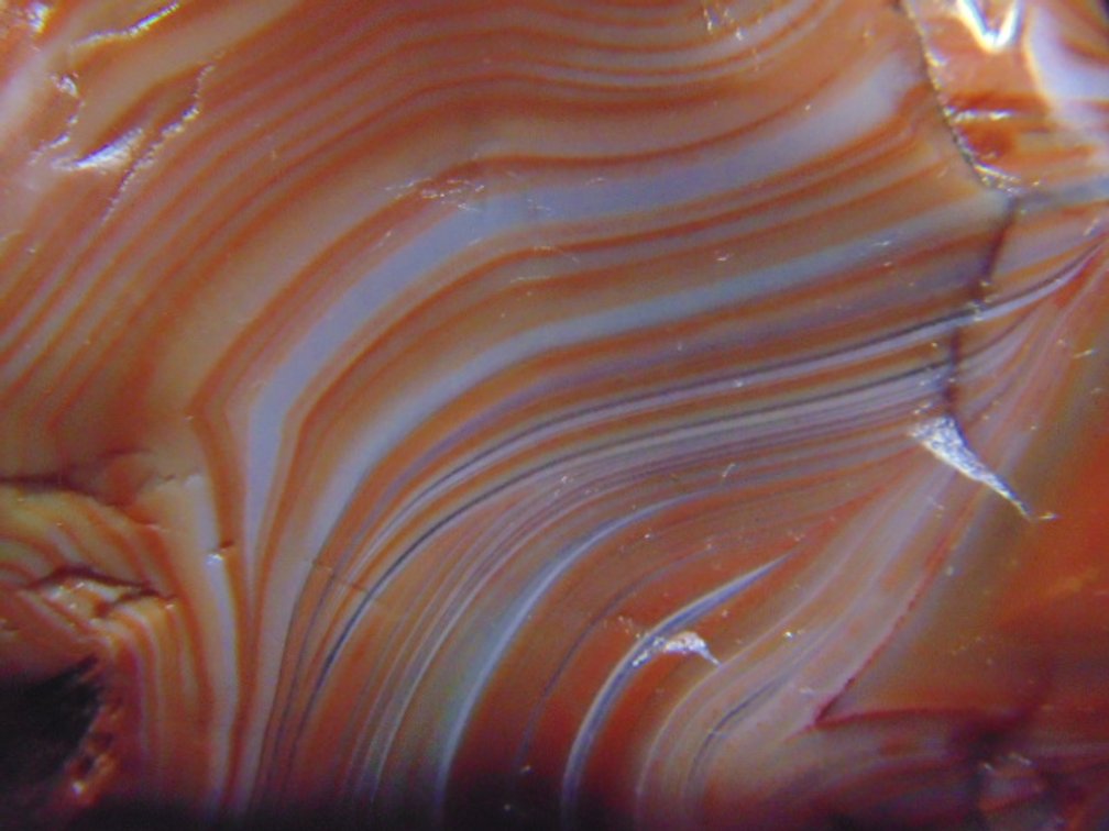 A 1.5 oz banded Lake Superior Agate with crystal impressions