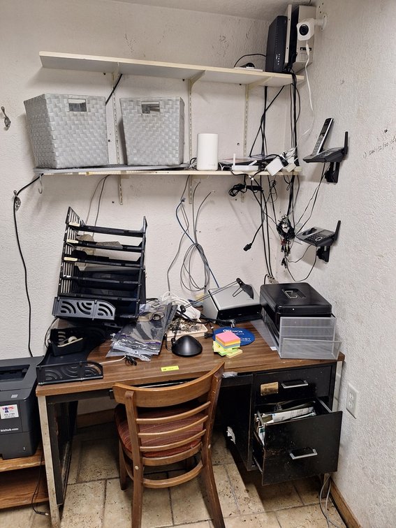 Desk with Assorted Office Supplies