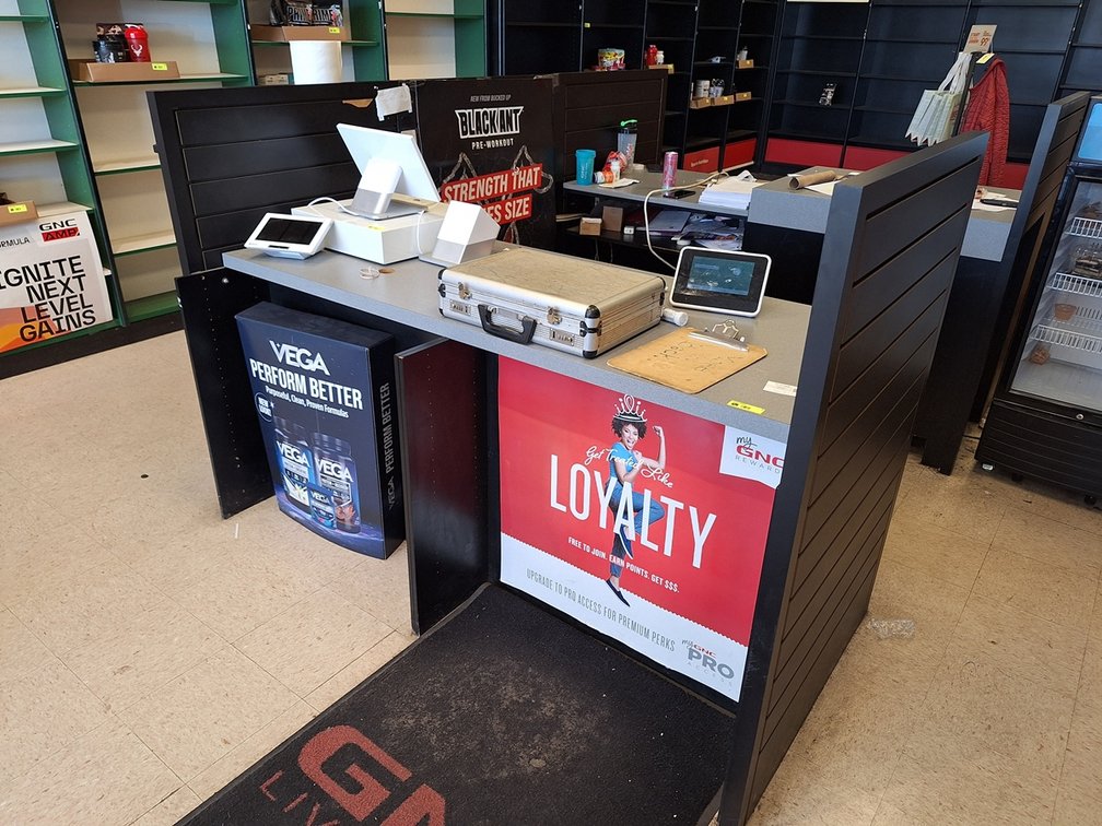2-Sided Retail Counter with Assorted Office Supplies