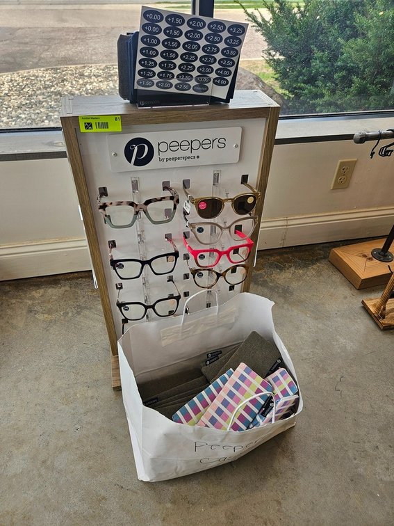 Glass Display with Assorted Glasses and Peepers Cases