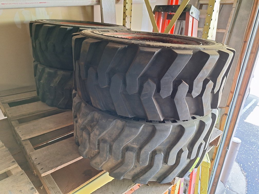 4 Camso Wide Wall 27x10.5 Skid Steer Tires with Rims