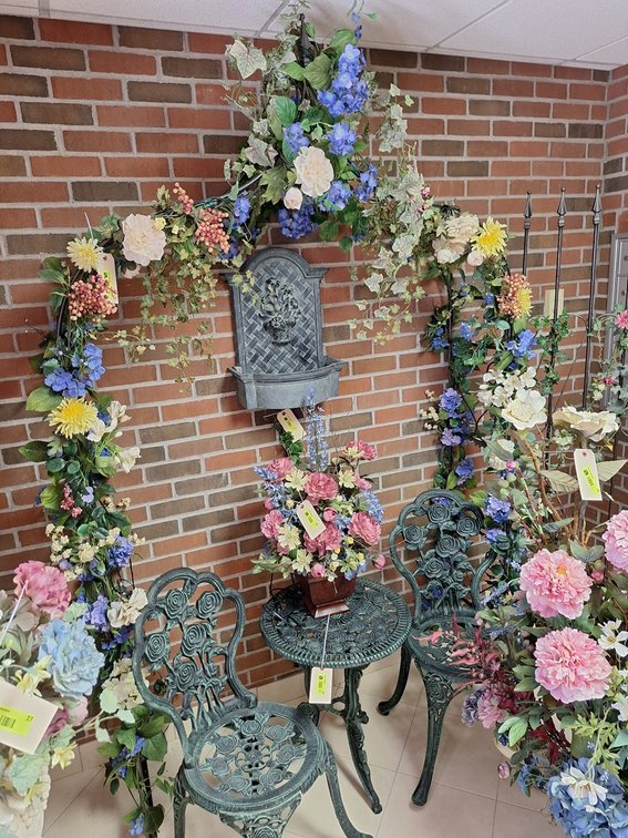 Ornate Metal Garden Arbor with Floral Decor