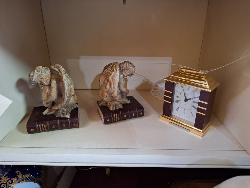 Bookends and Bulova Clock