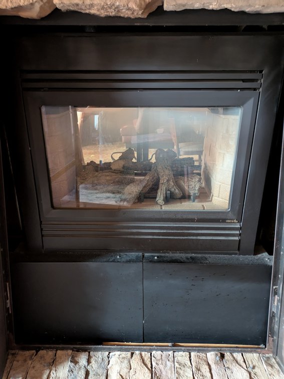 Heat n Glo 2- Sided Gas Fireplace with Metal Screens