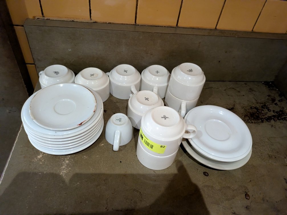 Assorted Coffee Mugs and Saucers