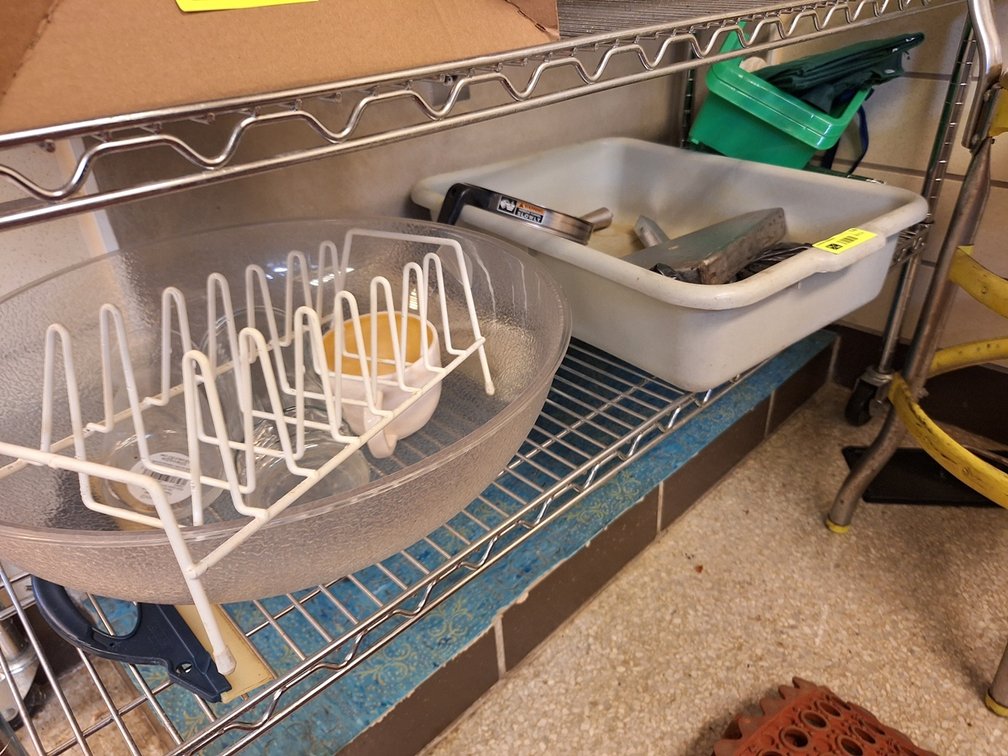 Assorted Kitchenware on Bottom Shelf