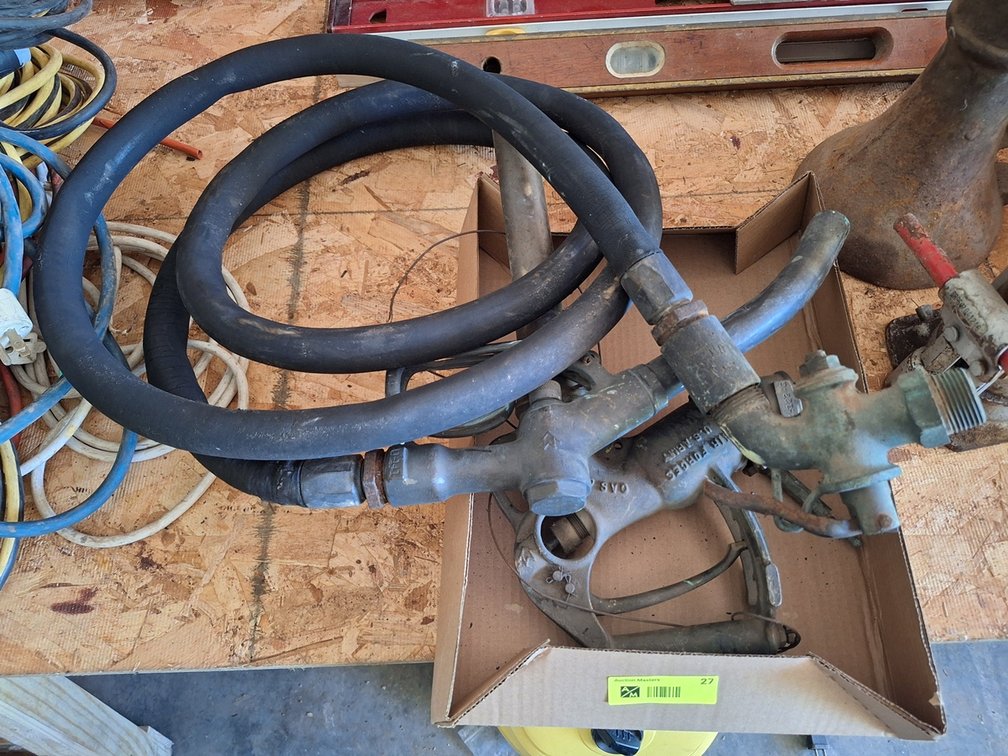 Vintage Gas Pump Nozzles with Hose