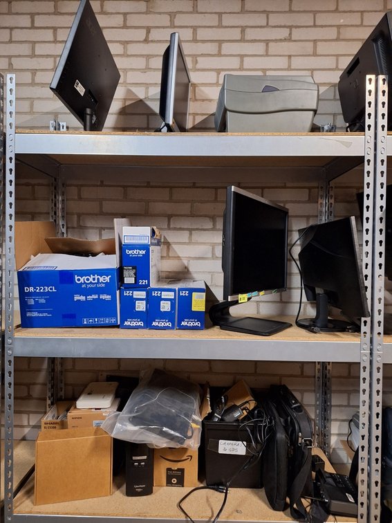 Assorted Computer Components on Shelves, Monitors, Printers and More