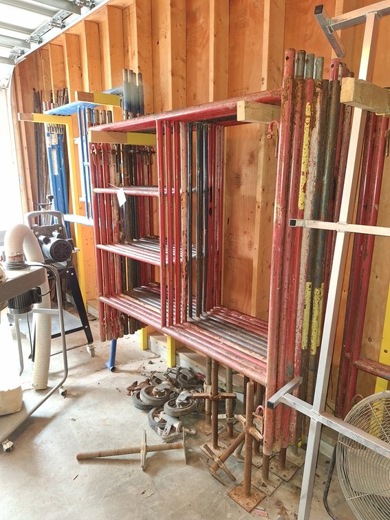 Scaffolding: 14 Wasco 5'x5' Uprights, 4 Bil-Jax 5'x5' Uprights, 8 Wheels, 14 Leveling Feet, Railing, Stairs, Crossbraces