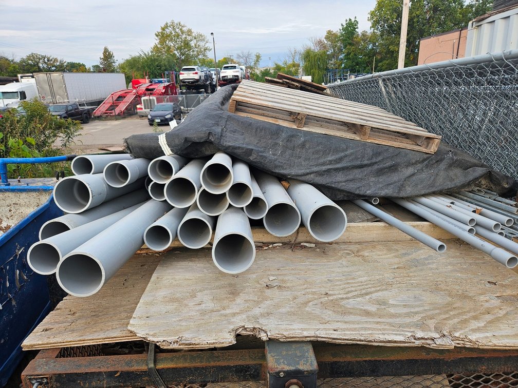 Assorted on Trailer, PVC Pipe, Cement Blankets, More