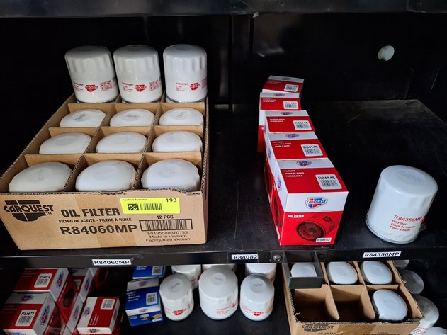 Image for Contents in Cabinet: Assorted Oil Filters and More