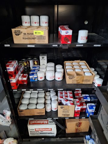 Image for Contents in Cabinet: Assorted Oil Filters and More