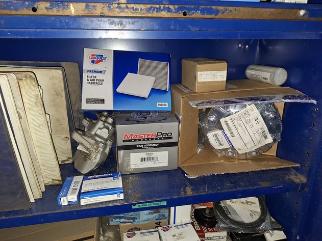 Image for Contents in Cabinet: Assorted Auto Parts