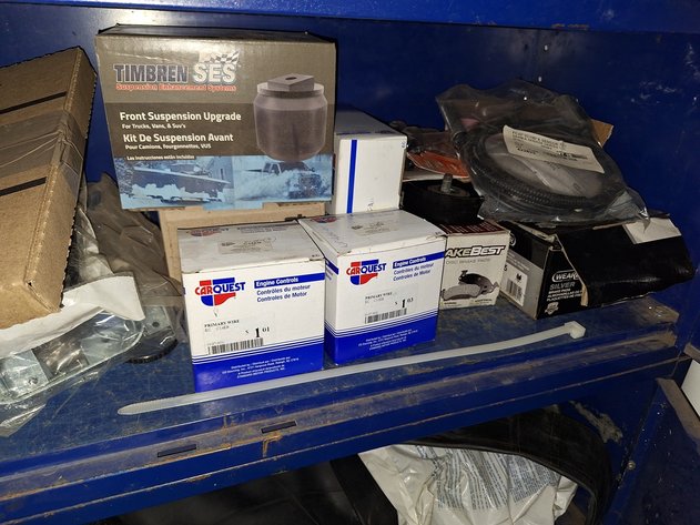 Image for Contents in Cabinet: Assorted Auto Parts