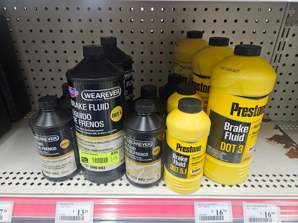 12 Assorted Brake Fluid Jugs, Prestone and Carquest