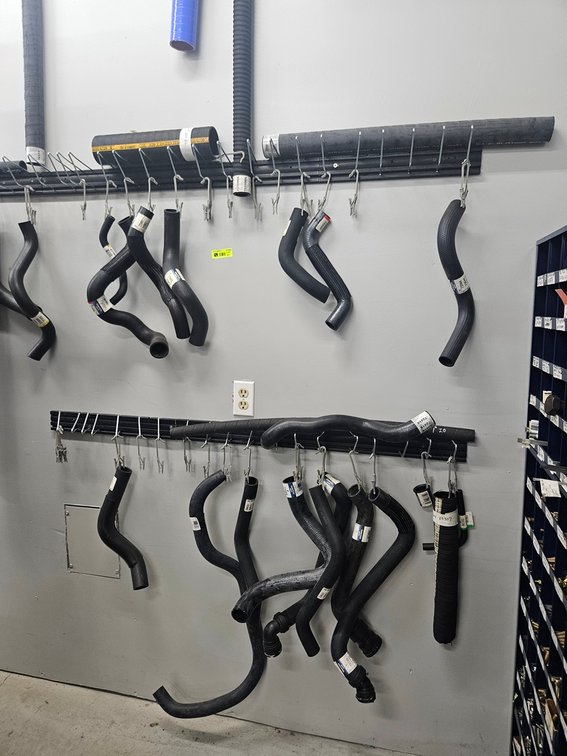 Assorted Rubber Hoses on Wall
