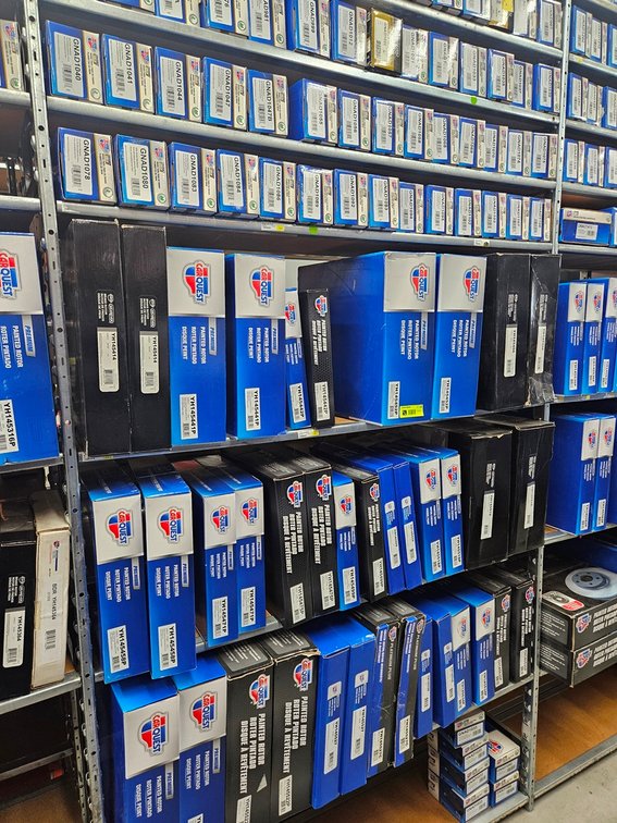 Assorted Carquest Brake Pads and Rotors in Section