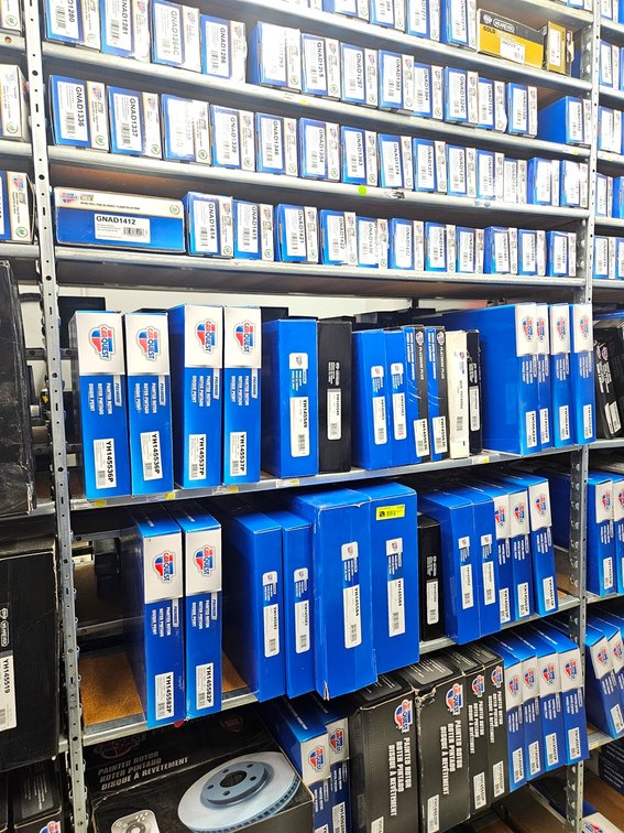 Assorted Carquest Brake Pads and Rotors in Section