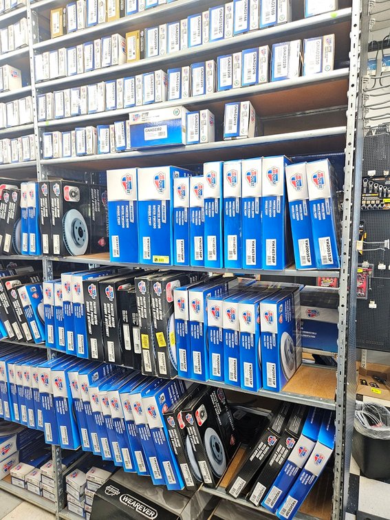 Assorted Carquest Brake Pads and Rotors in Section