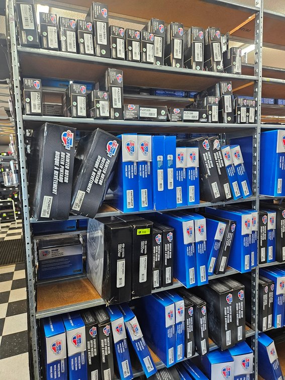 Assorted Carquest Brake Pads and Rotors in Section