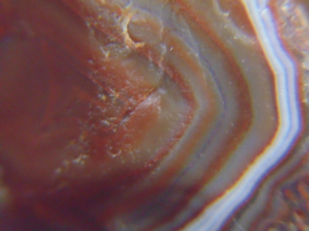 A .7 oz Lake Superior Agate with a nice full banded face