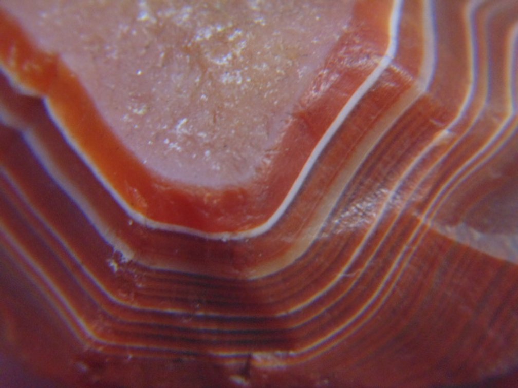 A .8 oz Lake Superior Agate with nice banding around a pocket of quartz