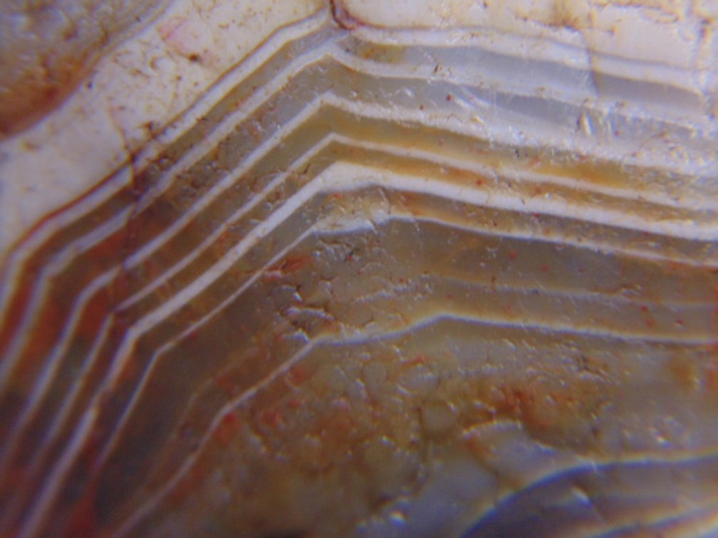A 1 oz uniquely colored Lake Superior Agate that is full of banding