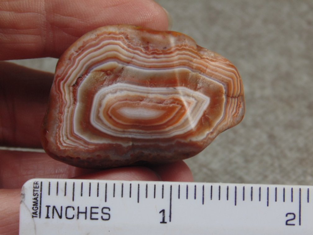 A 1.2 oz Lake Superior Agate with a big bold banded face and a satin finish