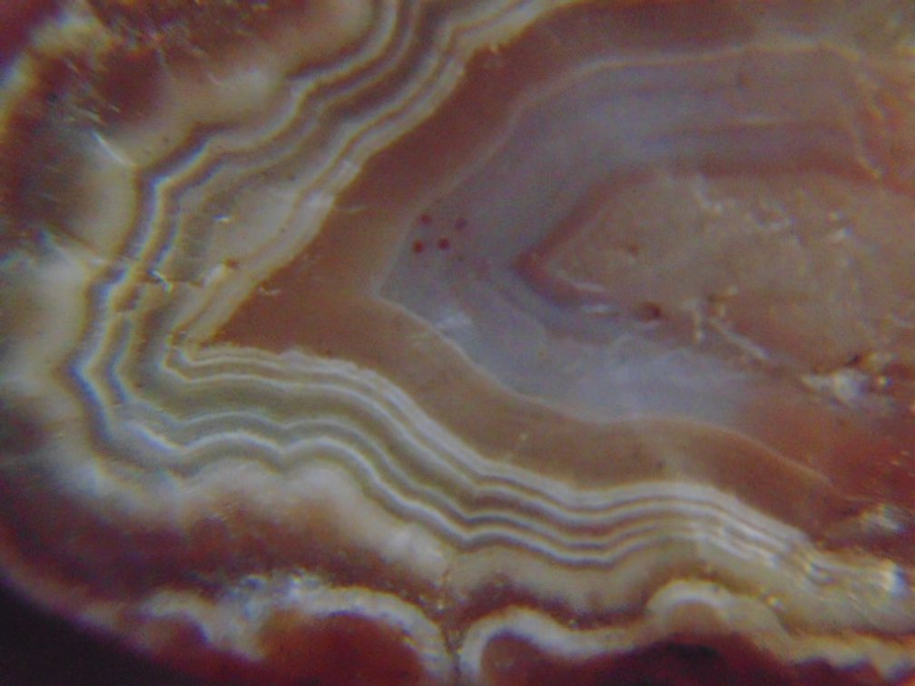 A .6 oz Lake Superior Agate with a nice full banded face