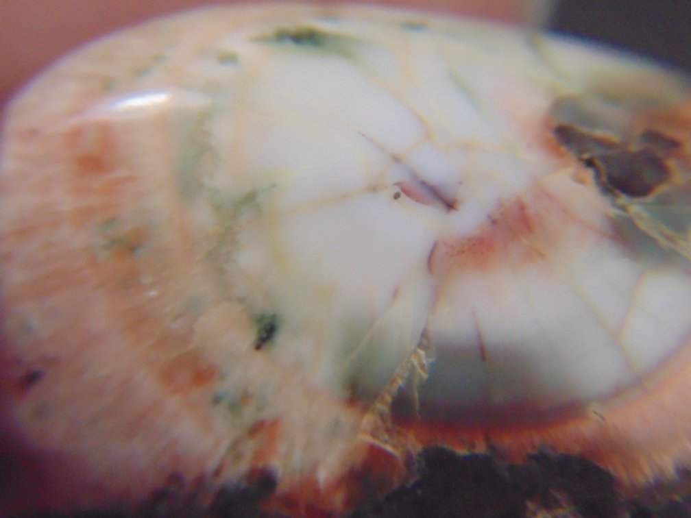 A polished Thomsonite nugget in matrix, 16 grams