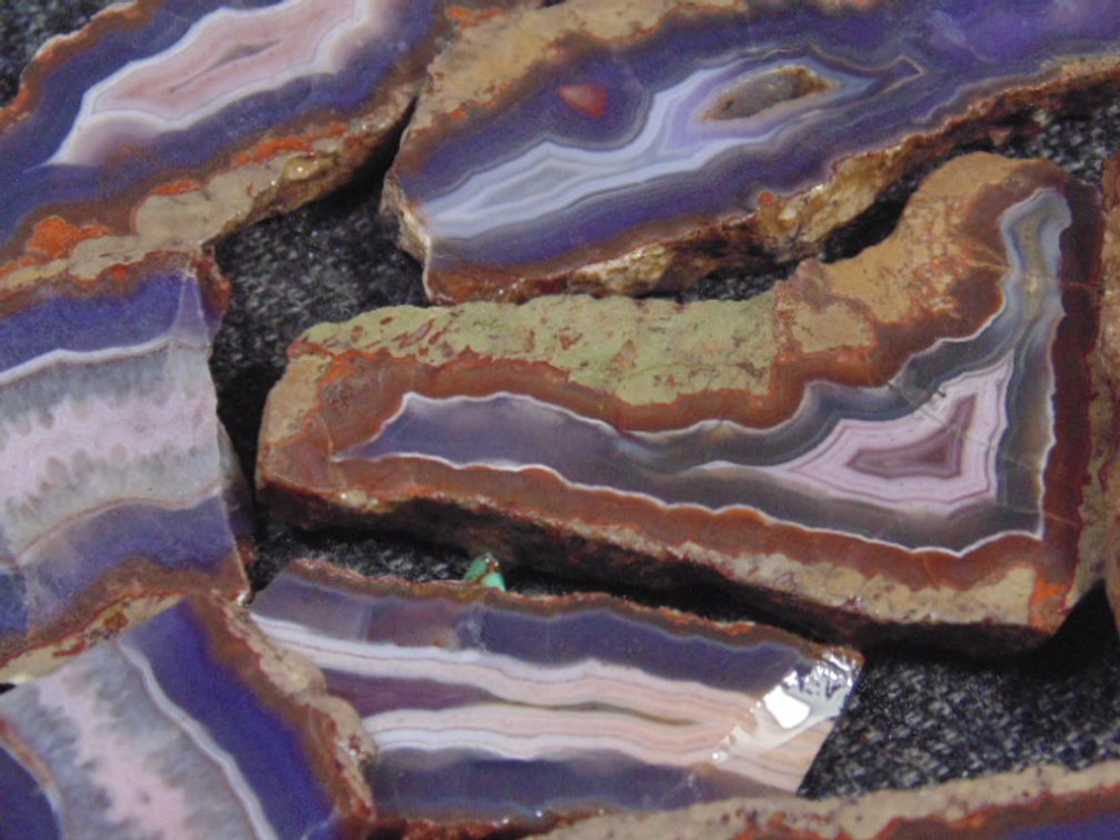 Several Purple Passion Agate slabs, 4 ozs