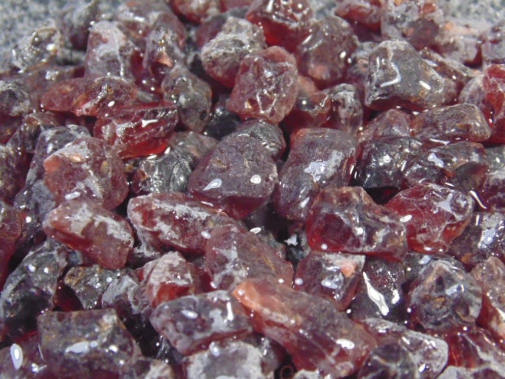 An assortment of faceting and cabbing grade Garnets, 4.1 ozs