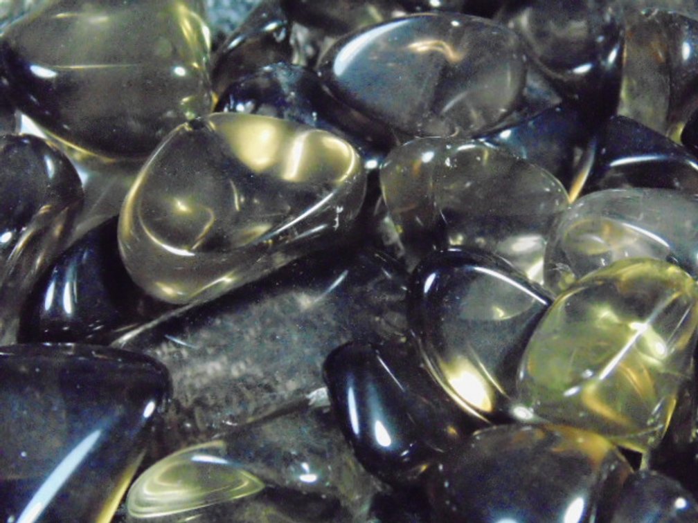 An assortment of faceting and cabbing grade dark Citrine, 5.6 ozs