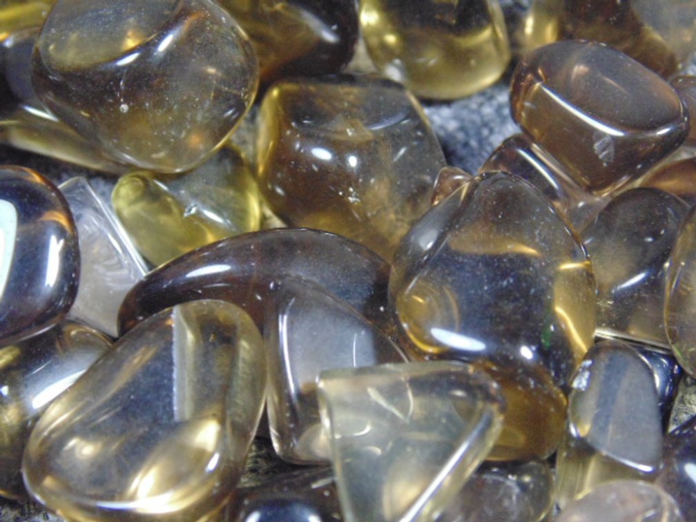 An assortment of faceting and cabbing grade dark Citrine, 5.7 oz