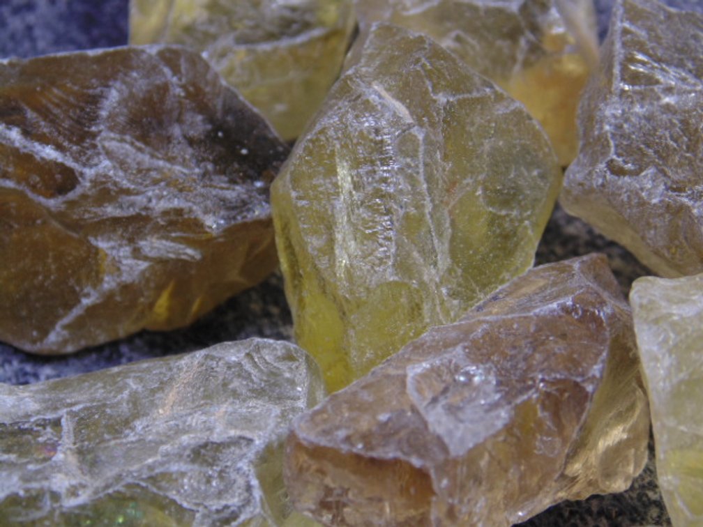 An assortment of faceting and cabbing grade lemon Citrine, 7.2 ozs