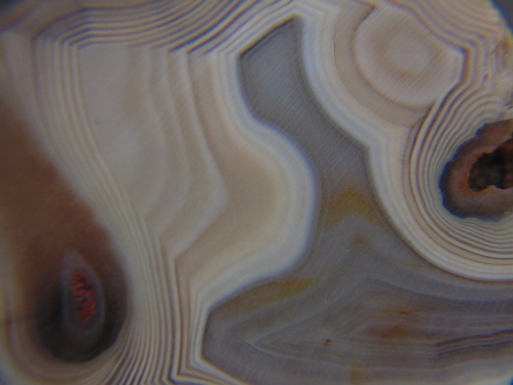 A beautifully banded 3.9 oz Lake Superior Agate half