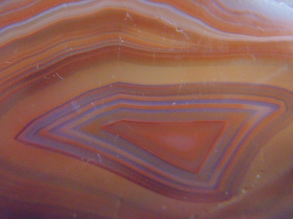 A beautifully banded 1.7 oz Lake Superior Agate half