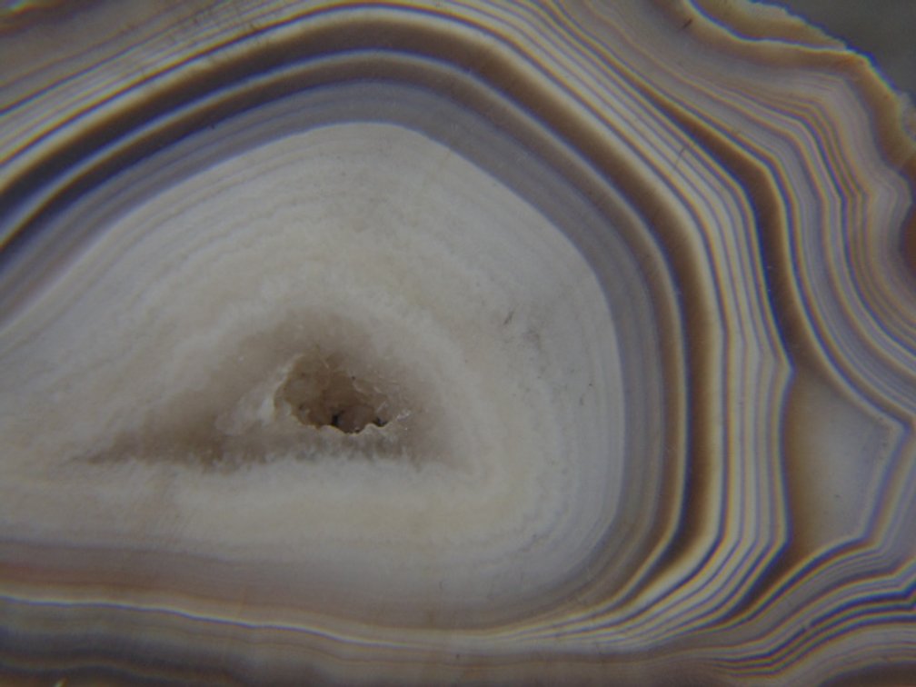 A beautifully banded 4.4 oz Lake Superior Agate end cut