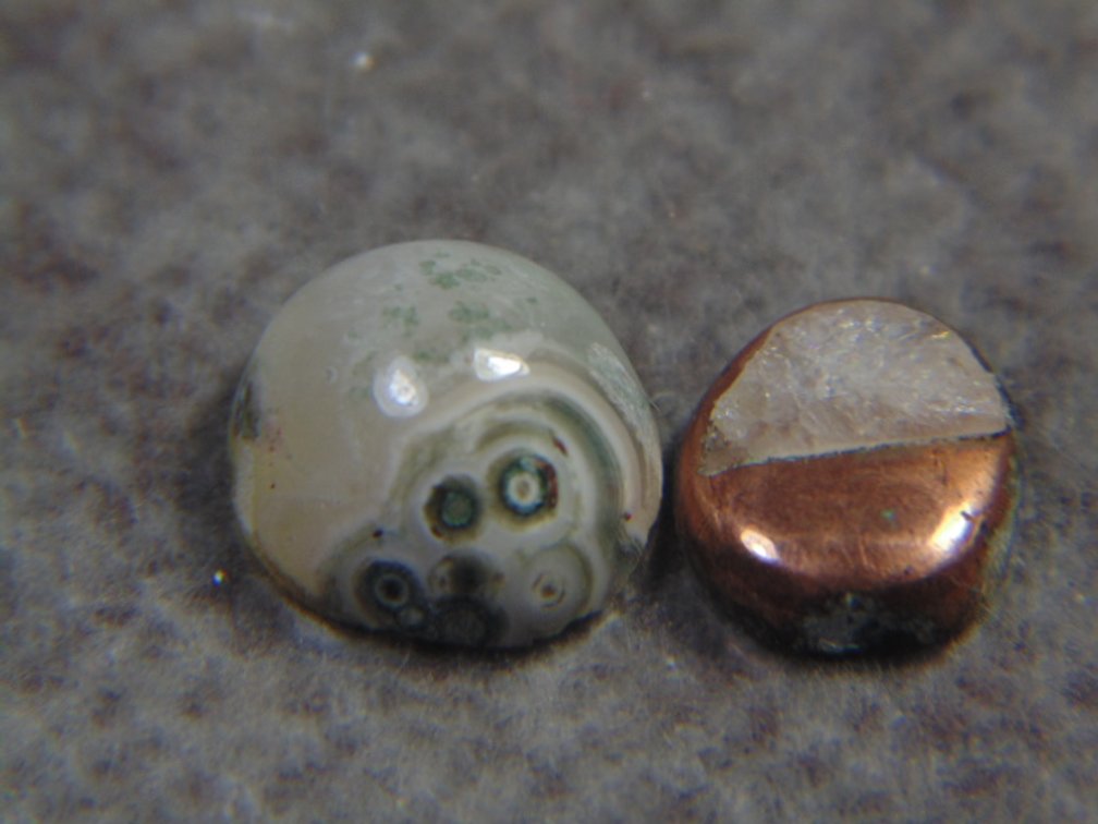 A pair of Copper Replacement  Agate cabs, 1.3 grams