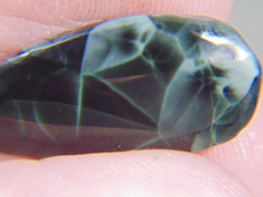 A face polished Greenstone nugget, 1.6 grams