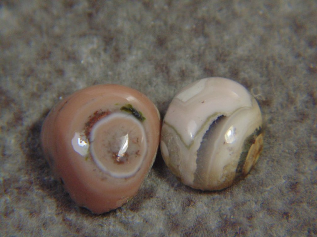 A pair of Copper Replacement  Agate cabs, 1 gram