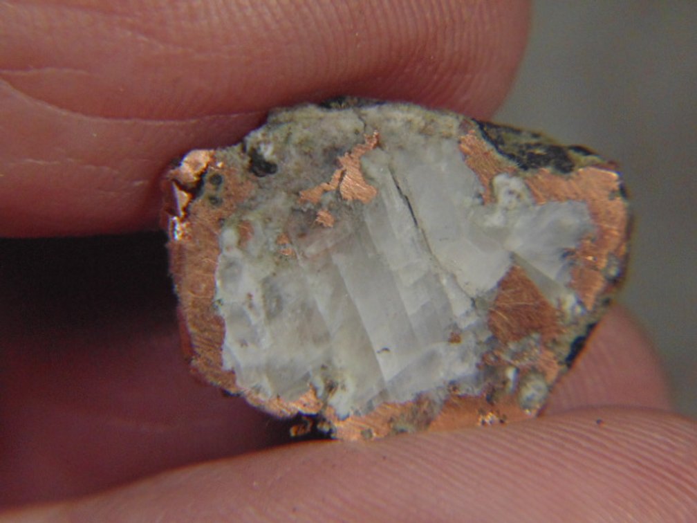 A face polished Copper Replacement Agate, 2.3 grams