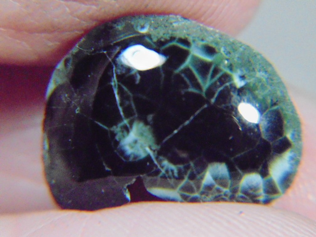 A face polished Greenstone nugget, 1.6 grams