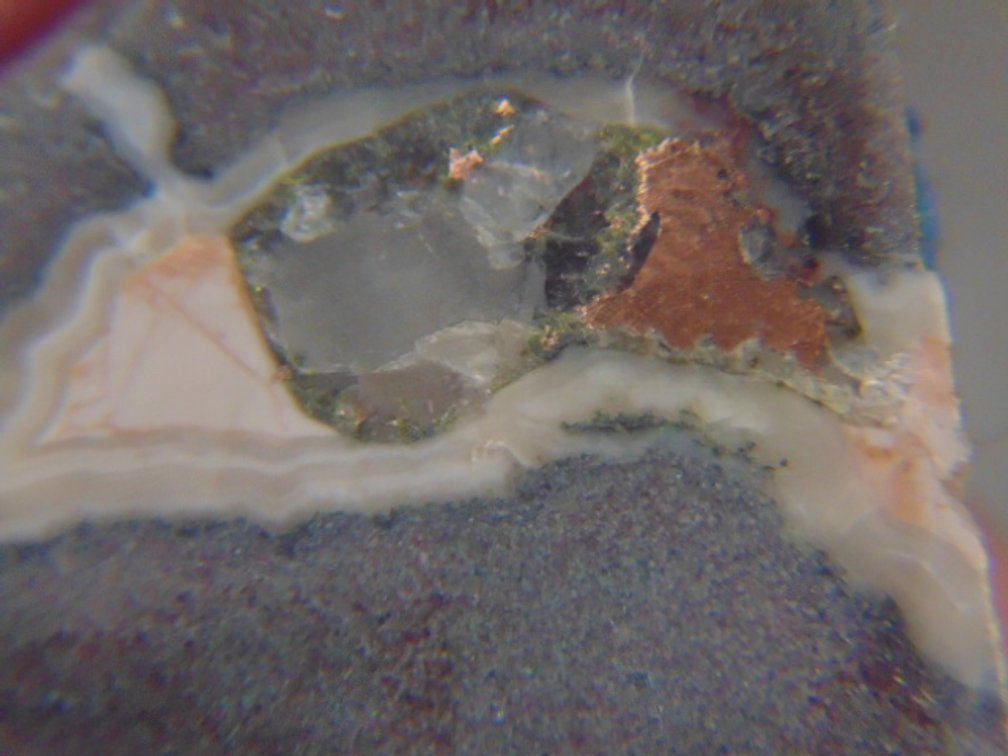 A face polished Copper Replacement Agate in matrix, 10.5 grams