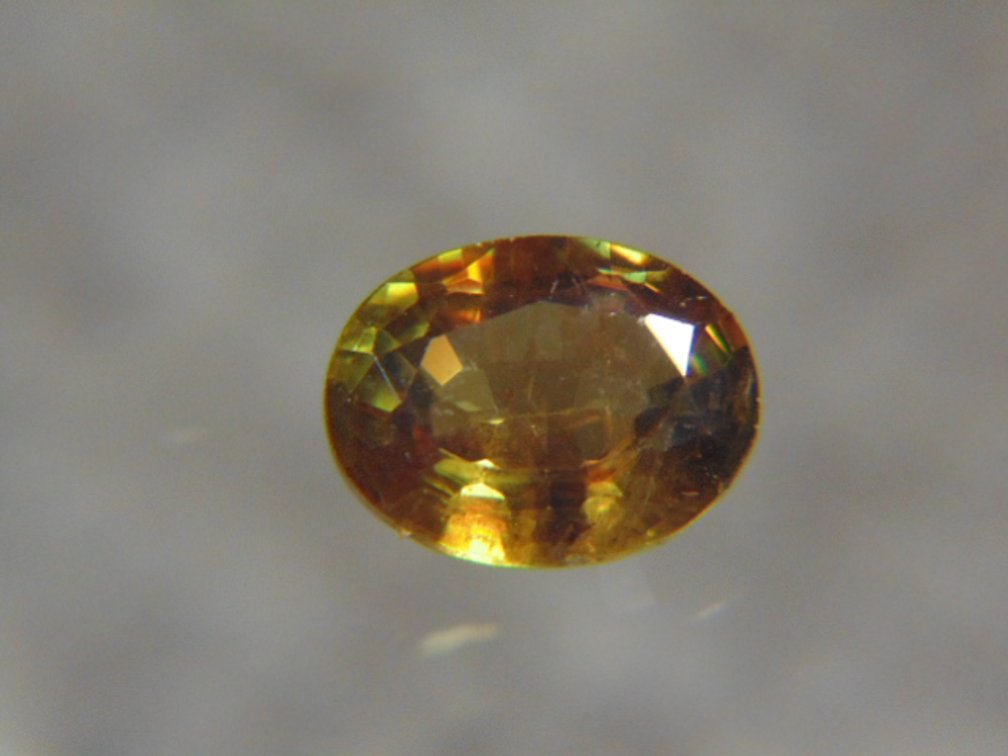 A 8 x 6 mm oval Sphene, 1 ct