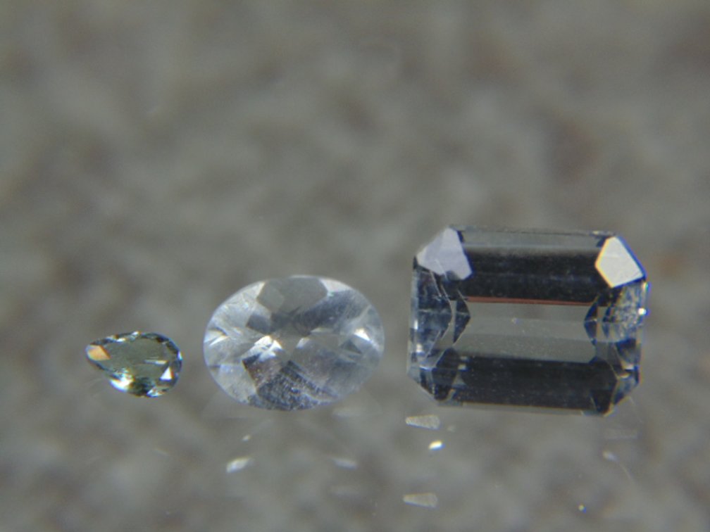 Three Aquamarine faceted stones