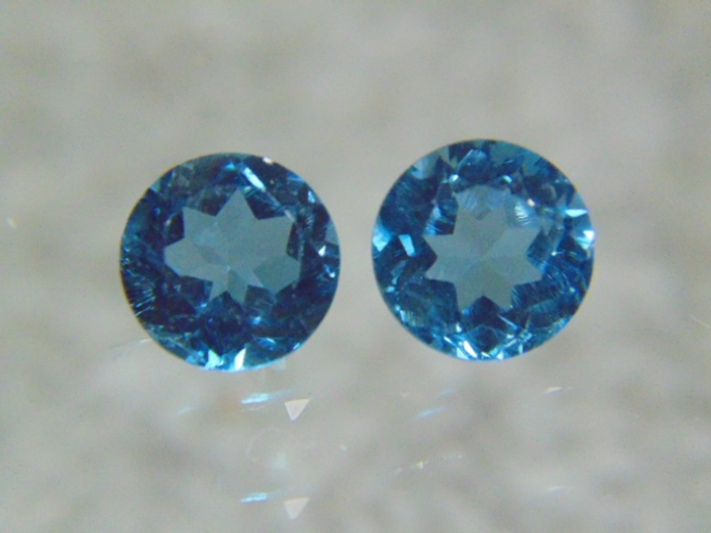 A pair of round Blue Topaz